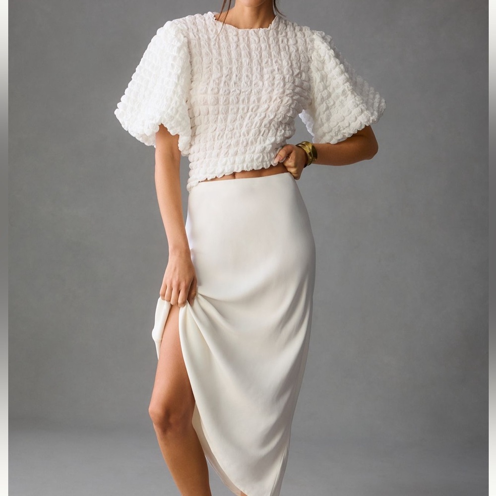 Anthropologie Textured puff-sleeve top